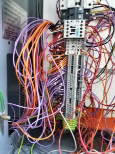 Cluttered PLC panel 2